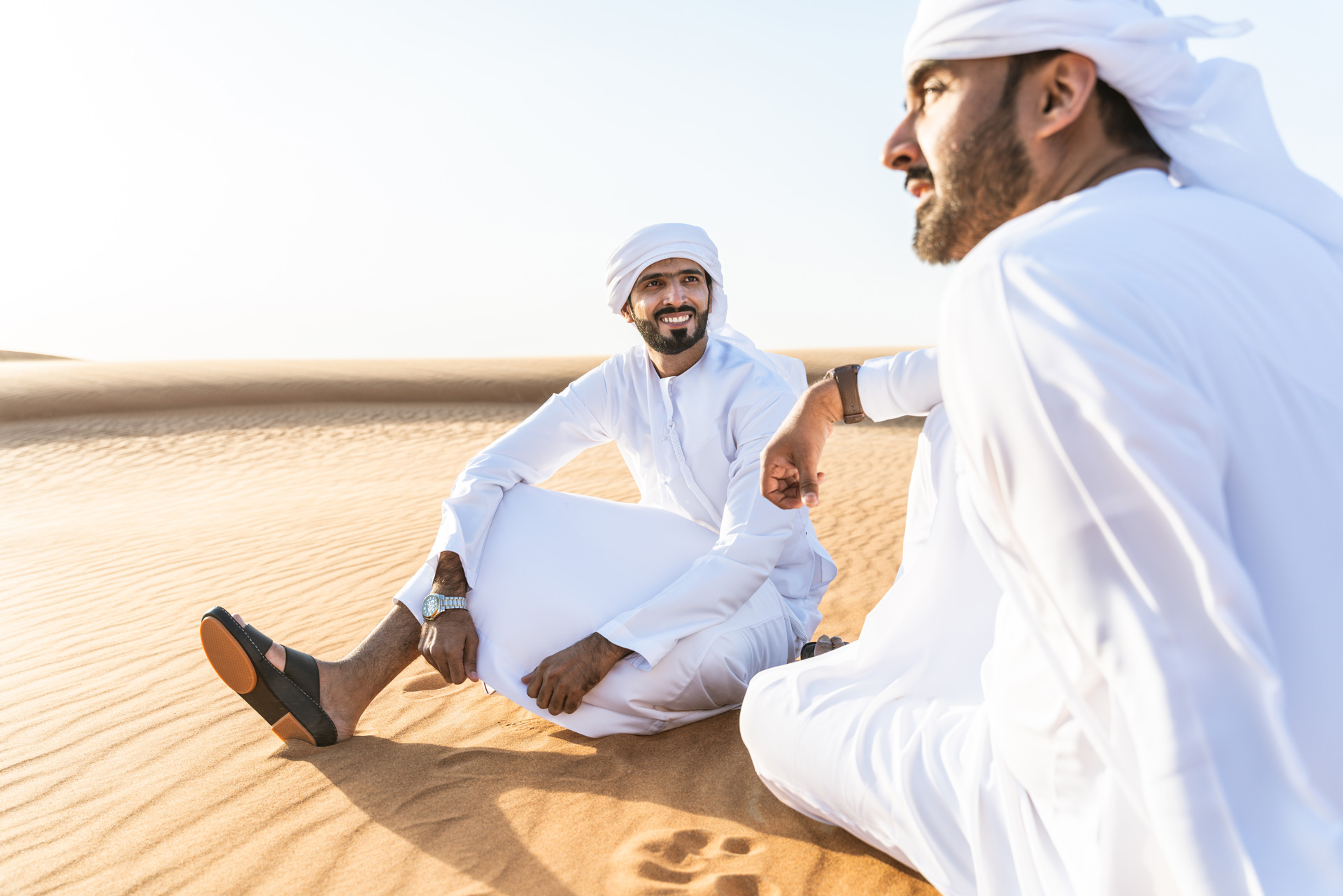 Business owners discussing legal support in the UAE